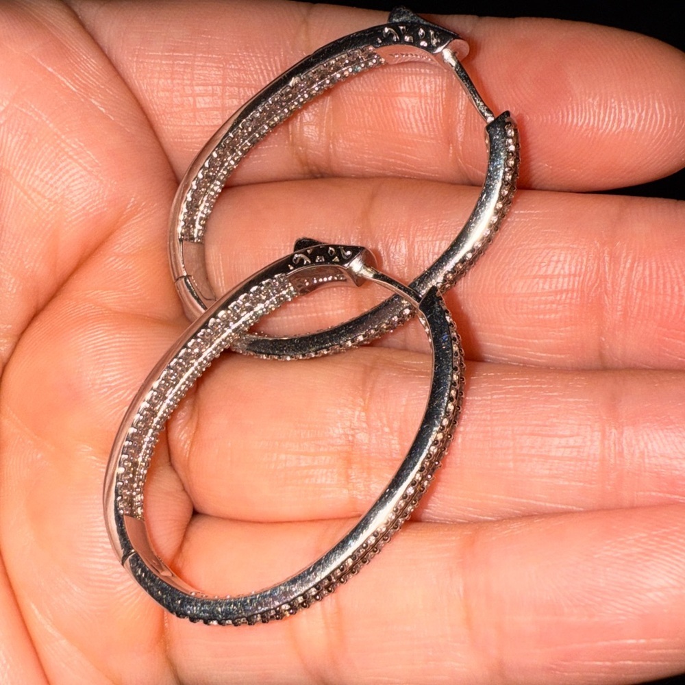 Elegant – These sparkling hoop earrings have a refined and sophisticated look. - Picture 10 of 14